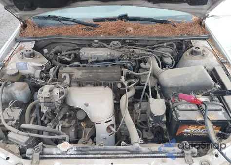 1998 Toyota Camry Le z USA, uszkodzony, nr VIN JT2BG22K2W0240036